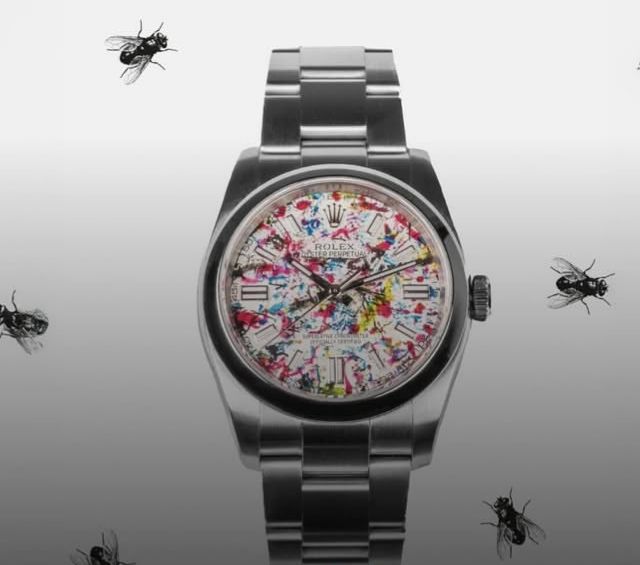 ساعة رولكس ملونة بقيء الذباب