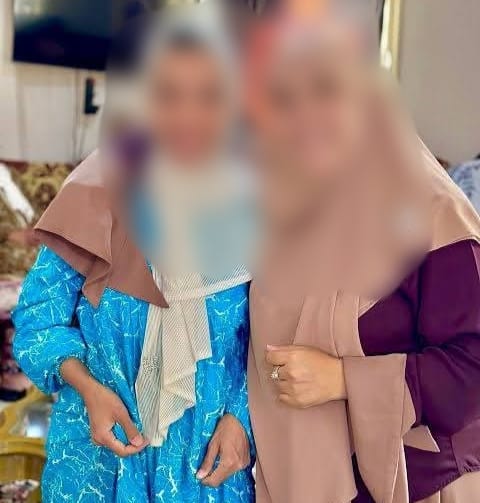 الضحية ومرافقة لها بالدار