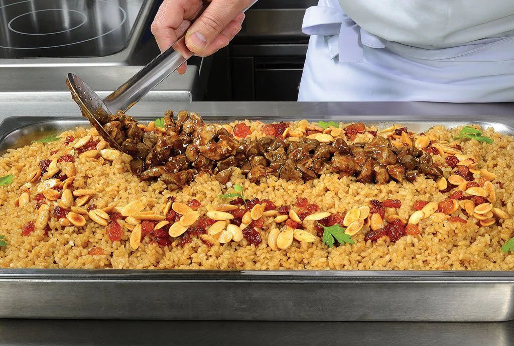 عمل أرز بالخلطة والزبيب واللوز